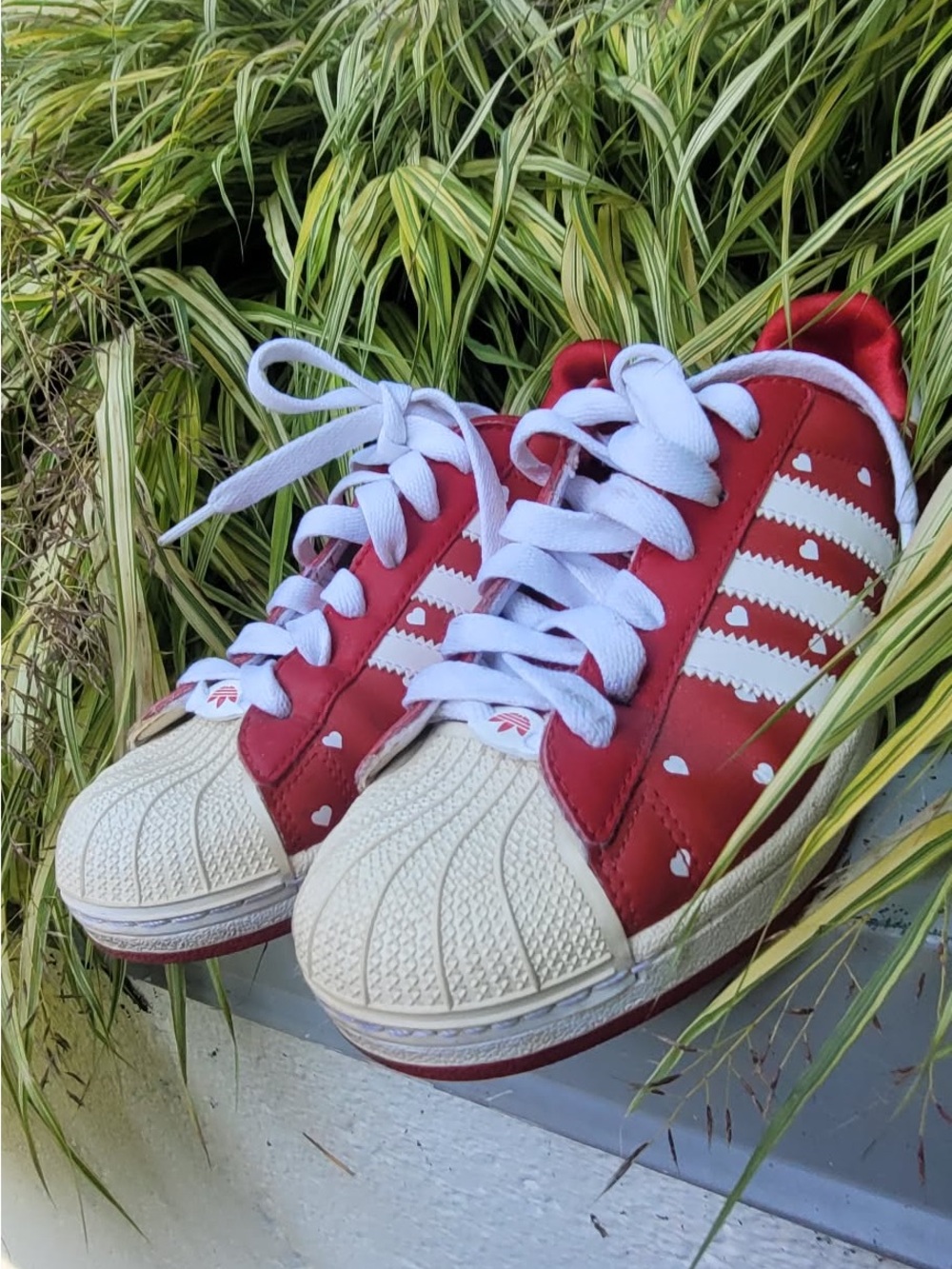 adidas Kids Red and White Shell Toe Sneakers with Heart Details